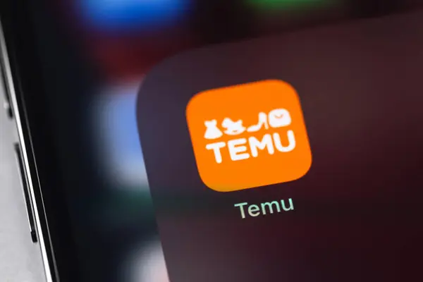 stock image Temu mobile icon app on a smartphone iPhone screen closeup. Temu, LLC is an American-based online marketplace. Batumi, Georgia - April 5, 202