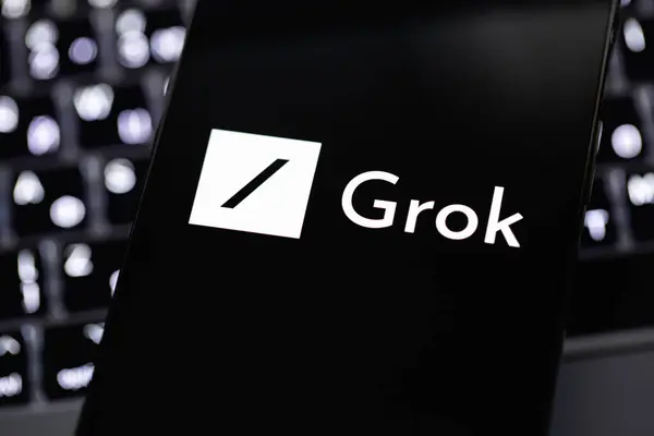 stock image xAI Grok chatbot logo on a screen smartphone closeup. Grok (Grok xAI)  is a new chatbot for X platform, created by Elon Musk. Batumi, Georgia - November 5, 2023 