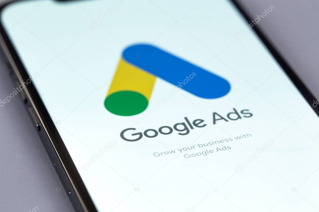 Google Ads logo mobile app on a screen smartphone iPhone closeup. Ads is a service of contextual, basically, search advertising from Google. Batumi, Georgia - October 5, 2023