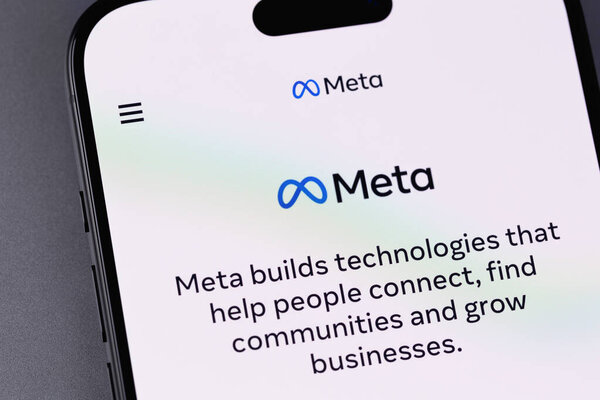 Meta logo on a screen smartphone, iPhone closeup. Meta Platforms, Inc. - American multinational holding company. Batumi, Georgia - November 9, 2023