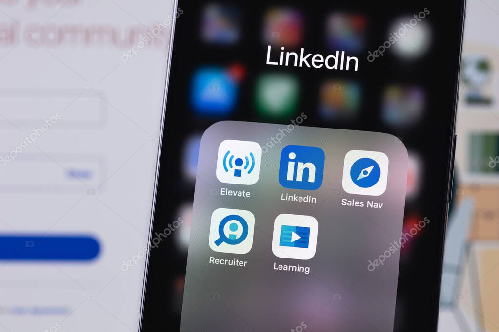 LinkedIn services mobile app on a screen smartphone iPhone. LinkedIn is a social network for finding and establishing business contacts. Batumi, Georgia - November 7, 2023