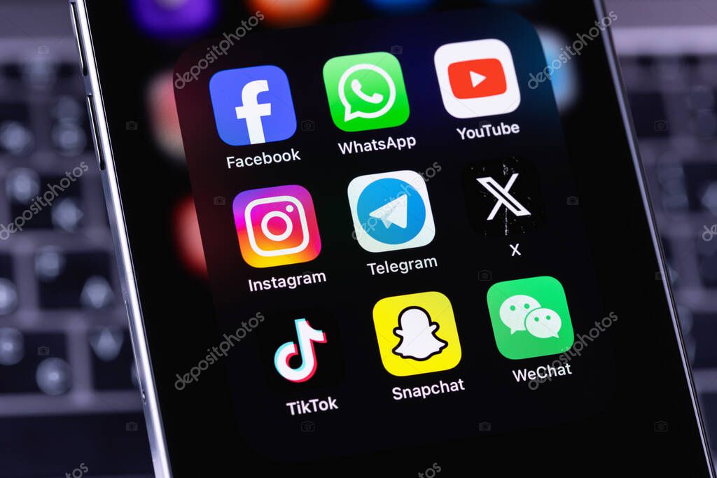 Smartphone iPhone with mobile icon app Facebook, WhatsApp, YouTube, Instagram, Telegram, Twitter X, TikTok, Snapchat, WeChat. Most popular social media platform for marketing. Batumi, Georgia - December 3, 2023