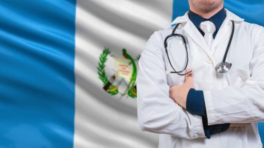 Guatemala bayrağında steteskoplu bir doktor. Guatemala bayrağı üzerinde steteskopla Doktor Kolları çapraz, Guatemala Ulusal Sağlık Konsepti