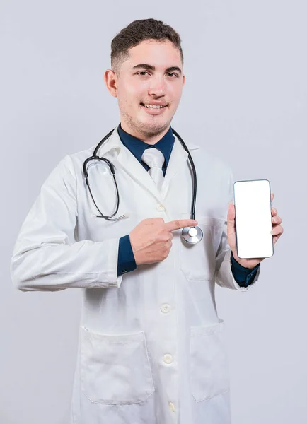 Cheerful Doctor Holding Pointing Cell Phone Screen Young Doctor Showing — Stock Photo, Image