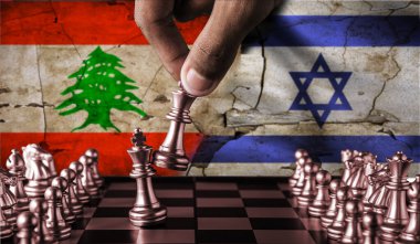 Israel vs Lebanon flag concept on chessboard. Political tension between Lebanon and Israel. Conflict between Lebanon and Israel on pieces of chessboard clipart