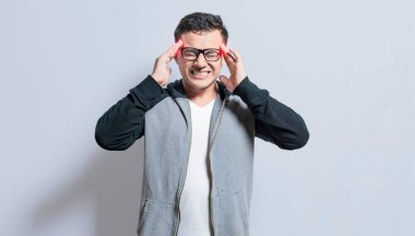 People with migraine rubbing their heads isolated, Concept of a person with a headache, guy giving himself a head massage, concept of a man with a migraine