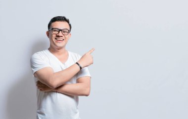 Smiling people pointing a banner to the side, Happy person pointing fingers to the sides, smiling man pointing a space to the side