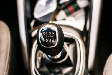 Close up of a car gear stick manual transmission, Manual gear lever of a car. Image of a car gear stick manual transmission.