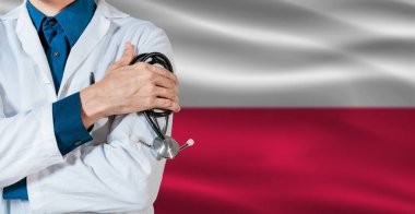 Polonya bayrağında steteskoplu bir doktor. Polonya bayrağında steteskop tutan doktor.