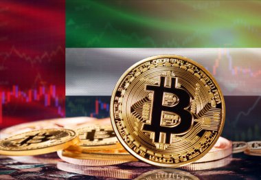 Arka planda Birleşik Arap Emirlikleri bayrağı olan Bitcoin. Birleşik Arap Emirlikleri 'ndeki Kripto Para Birimi ve Engelleme Teknolojisi Yatırımcıları