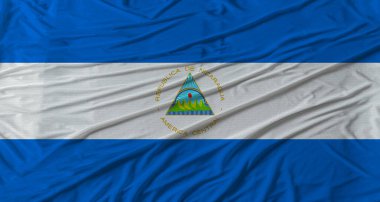 Nikaragua bayrağı dalgalanıyor. Kumaş desenli Nikaragua bayrağı