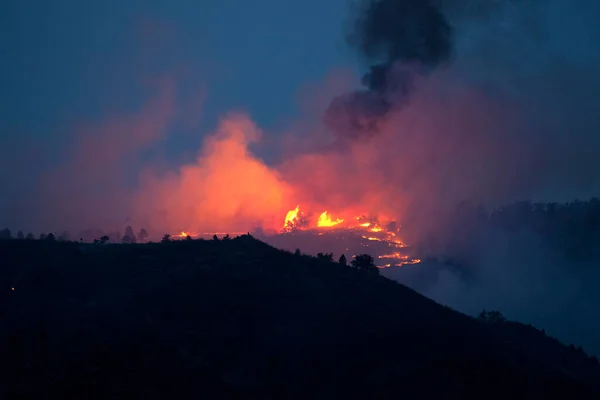 stock image Flames and smoke on the mountain side at the Indian Gulch Fire. March 3rd, 2011 in Golden, Colorado.