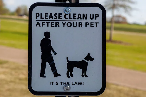 Please Clean Up After Your Pet. It\'s The Law sign