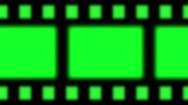 Yeşil arka planda eski sinema şeridi döngüsü. Yüksek kalite 4k görüntü