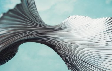 Soyut duvar kağıdı. Sanat dekoru. Tırtıklı alüminyum yapı. Mavi gri kıvrımlı kıvrımlı çizgili desenli metal çizim arkaplanı.