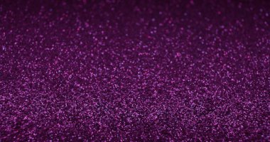 Parlak soyut arkaplan. Bulanık kıvılcım dokusu. Parlaklık sekansı. Odaklanmamış neon rengi pembe parlak daireler koyu serbest duvar kağıdında parlıyor..