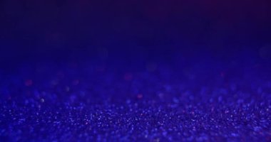 Bokeh ışık arkaplanı. Reklam vitrini. Odaklanmamış neon mavisi renk gradyan parlak parlaklık soyut doku ve boş alan. RED Sinema Kamerasında Çekim.
