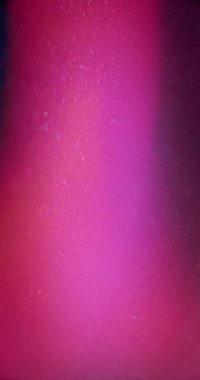 Neon light flare. Defocused glitter glow. Sequin gleam. Blur fluorescent pink purple color gradient flare sparkles texture vivid abstract empty space background.