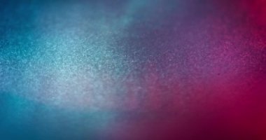 Blur glitter texture. Color gradient background. Shimmering grain. Defocused neon blue pink glow sparkles on bright abstract overlay for intro. Shot on RED Cinema camera.