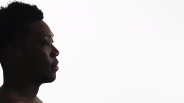 Man face profile silhouette. Dream inspiration. Side view portrait of relaxed confident guy isolated on white empty space background.