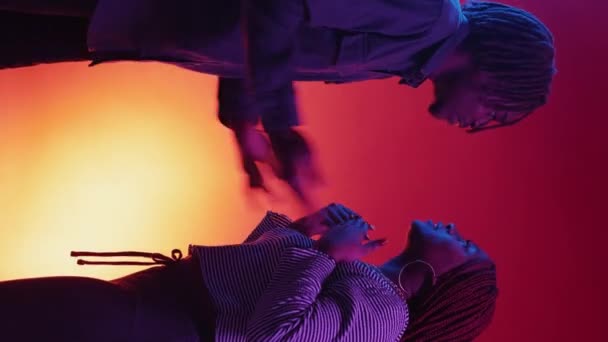 Vertical Video Couple Jealous Neon Light Portrait Quarreling Angry Black — Vídeo de stock