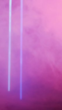 Vertical video. Color smoke. Blur glow. Ultraviolet mist. Defocused neon pink blue light vapor floating on bright abstract free space background.