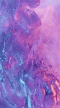 Vertical video. Paint splash. Ink water. Magic explosion. Blue pink purple neon color light shimmering glitter fluid flow motion abstract background.