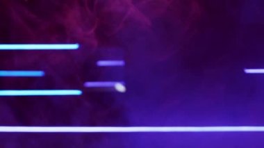 Color smoke. Blur glow. Fluorescent flare. Defocused neon purple blue light vapor floating on dark abstract free space background.