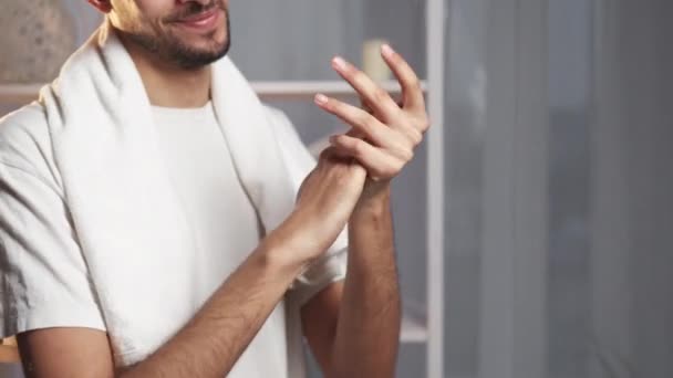 Hand Moisturizing Skin Treatment Cosmetic Dermatology Satisfied Smiling Man Smearing — 비디오