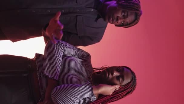 Vertical Video Boring Date Neon Light Couple Inspired Black Man — Wideo stockowe