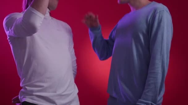 Success Greeting Male Partnership Neon Light Video Unrecognizable Casual Men — Vídeo de Stock