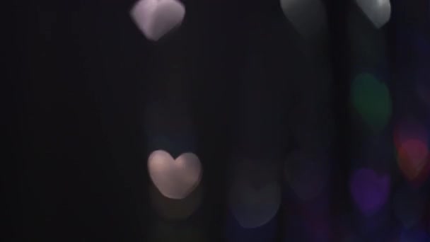 Blurred Heart Shaped Lens Flare Valentines Day Flickering Bokeh Background — Vídeo de Stock