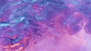 Paint splash. Ink water. Magic explosion. Blue pink purple neon color light shimmering glitter fluid wave flow motion abstract background.