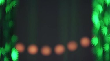 Festive multicolor bokeh. Abstract New Year background design pattern. Fairy lights curtain moving