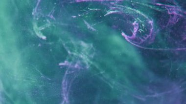 Color mist abstract background. Dreamlike air. Green purple neon light shimmering glitter texture fog floating spreading motion.