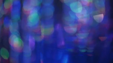 Defocused abstract lens flare background. Blurry bokeh lights flicker