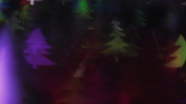 Festive Multicolor Bokeh Flickering Fur Tree Shaped Christmas Lights Background — Stock video