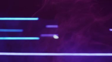 Neon background. Blur light. Laser illumination. Defocused purple blue color lines glow smoke floating on dark abstract free space.