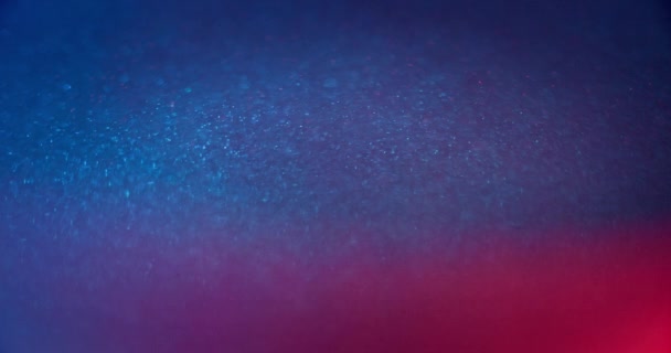Defocused Neon Glow Bokeh Light Texture Fluorescent Sequin Glare Blur — Stockvideo