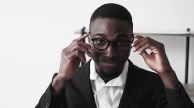Successful businessman. Happy career. Corporate confidence. Portrait of cheerful smiling millennial man executive in stylish formal suit at office.