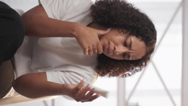 Vertical Video Confusing Cosmetics Skincare Choice Puzzled Concerned Pensive Woman — Stock Video