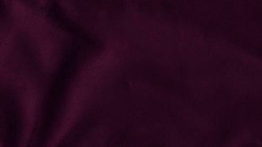 Creased leather. Embossed texture. Textile material. Dust scratches on dark purple skin uneven grunge abstract illustration free space background.