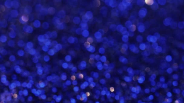Defocused Lights Blue Background Spangle Magic Bright Electric Color Tinsels — Stockvideo