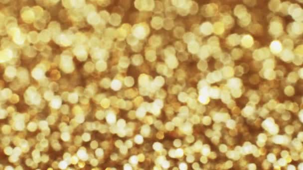 Arany Fények Ünnepi Háttér Elmosódott Fény Sárga Villogó Megvilágítás Csillogó — Stock videók