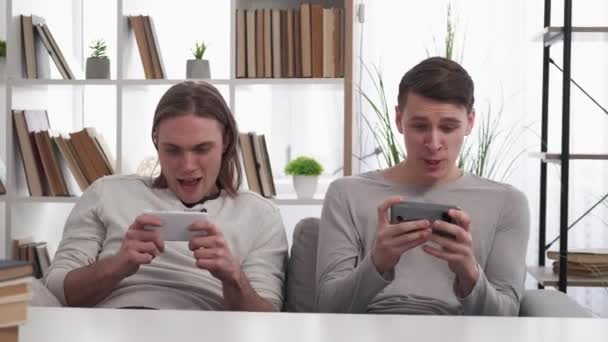 Winner Excitement Gaming Men Joyful Success Happy Male Friends Celebrating — Stockvideo