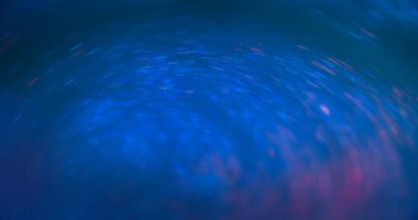 Blur neon light. Bokeh rays texture. Firework sparks. Defocused fluorescent blue pink color glow shiny particles swirl abstract background with free space.