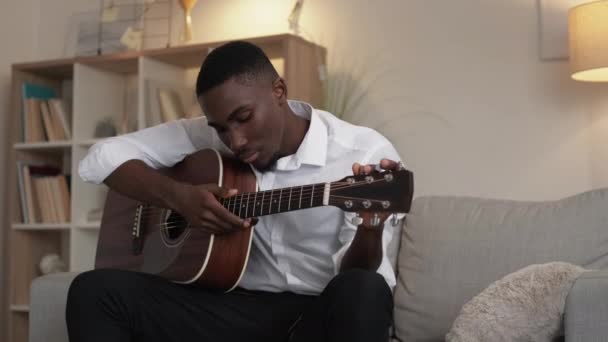 Musical Hobby Male Beginner Home Practice Serious Man Musician Adjusting — Vídeo de Stock