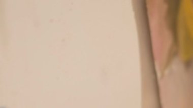 Vertical video. Painting essentials. Art supplies set. Creative workplace. Closeup of acrylic watercolor paint palette artwork paintbrush kit organizer.