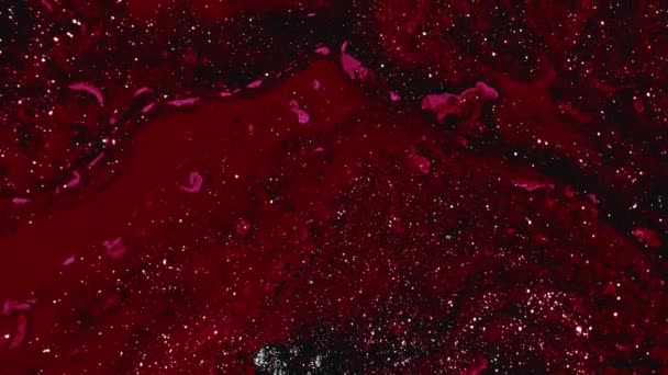 Glitter Paint Fluid Flow Sparkling Wave Defocused Shimmering Glowing Red — Stock Video