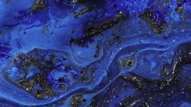 Köpüklü sıvı. Boya karışımı. Mermer dokusu. Odaklanmamış parlak, mavi, siyah, yağ rengi parlatıcı desen, mürekkep karışımı dalga hareketi soyut arkaplan.